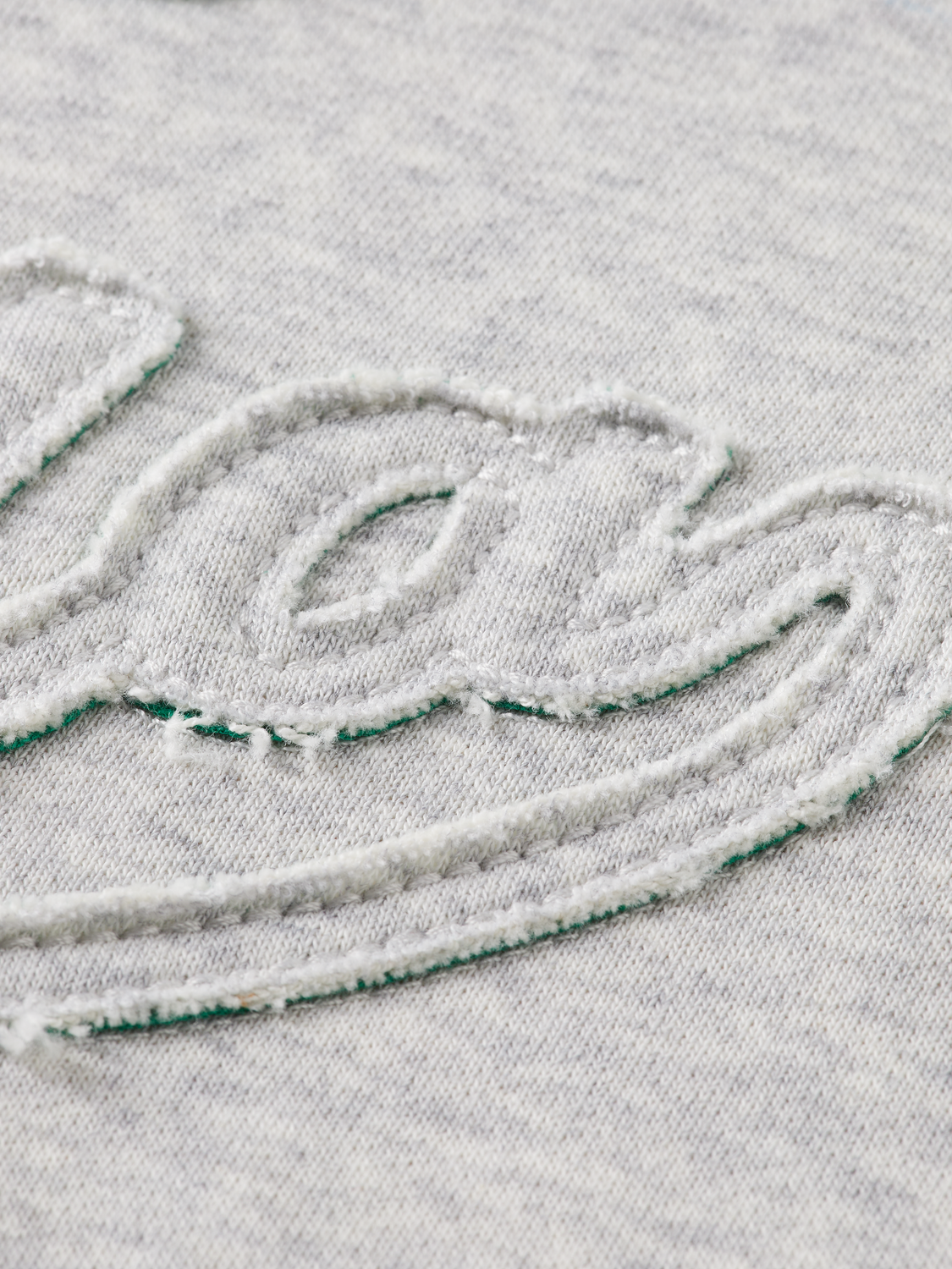 Applique artwork loose sweater