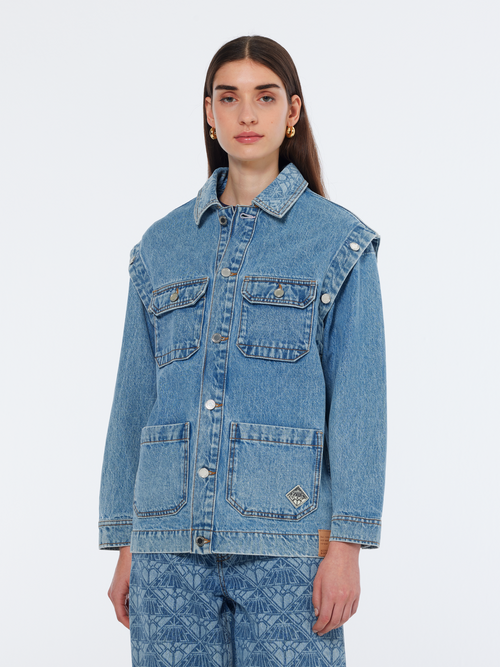 Washed denim jacket with detachable sleeves