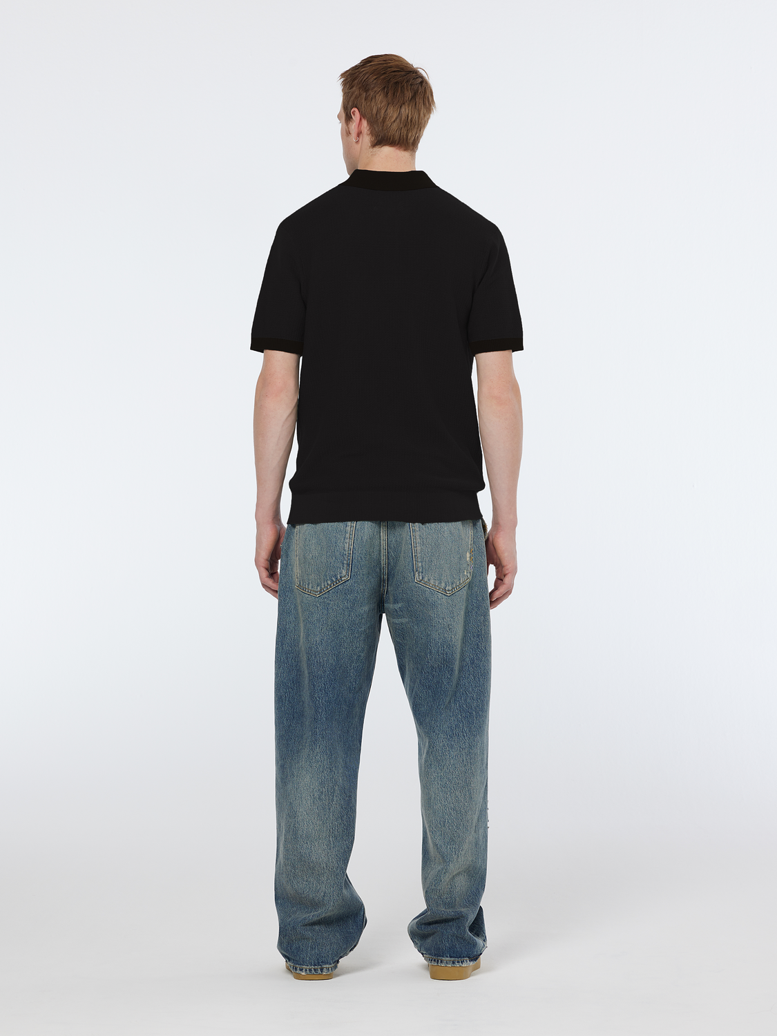 Structured knitted solid polo