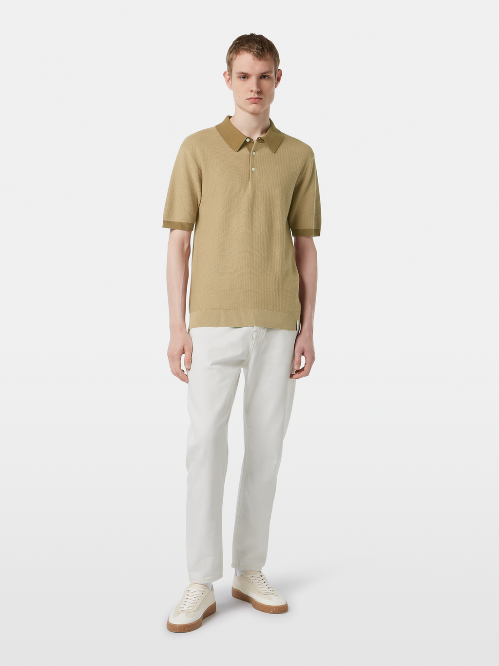 Structured knitted solid polo