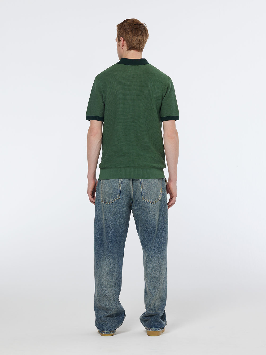 Structured knitted solid polo