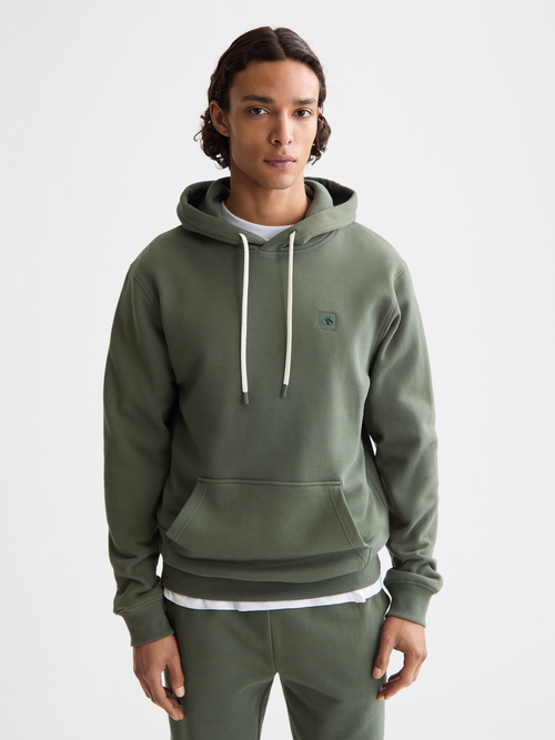 Seasonal core - Regular-fit logo badge hoodie