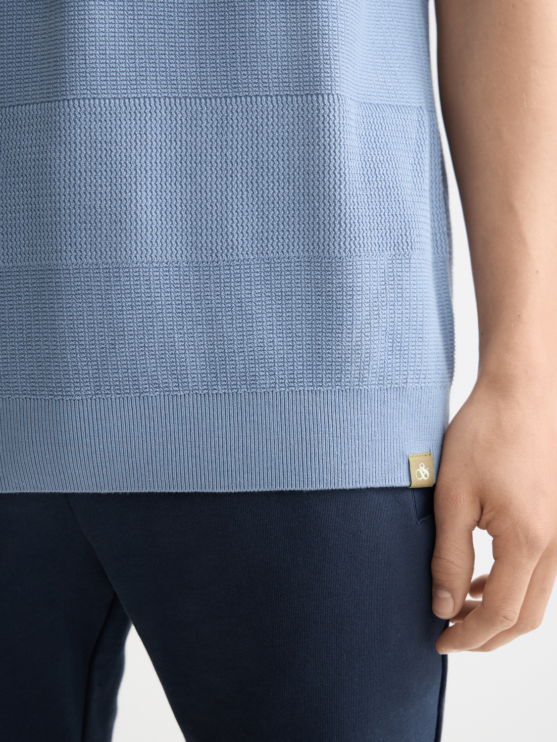 Knitted tonal striped regular polo