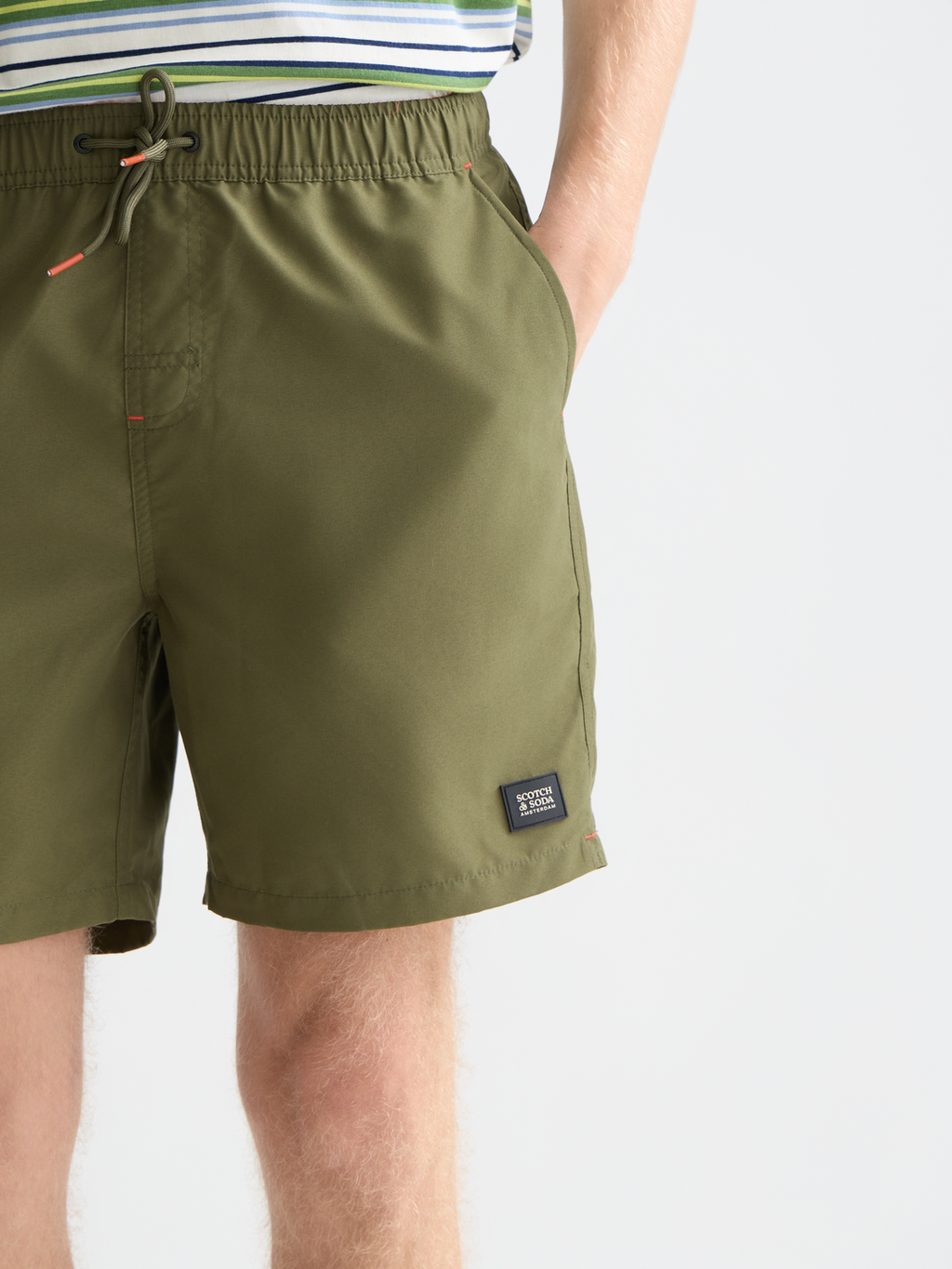 Solid midlength swim shorts