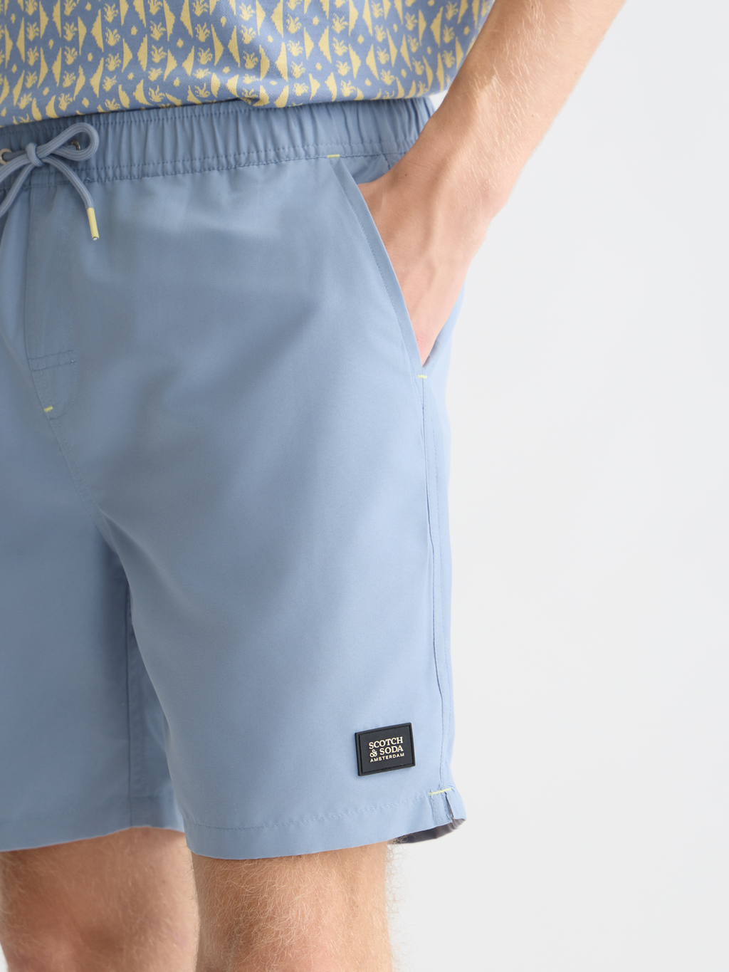 Solid midlength swim shorts