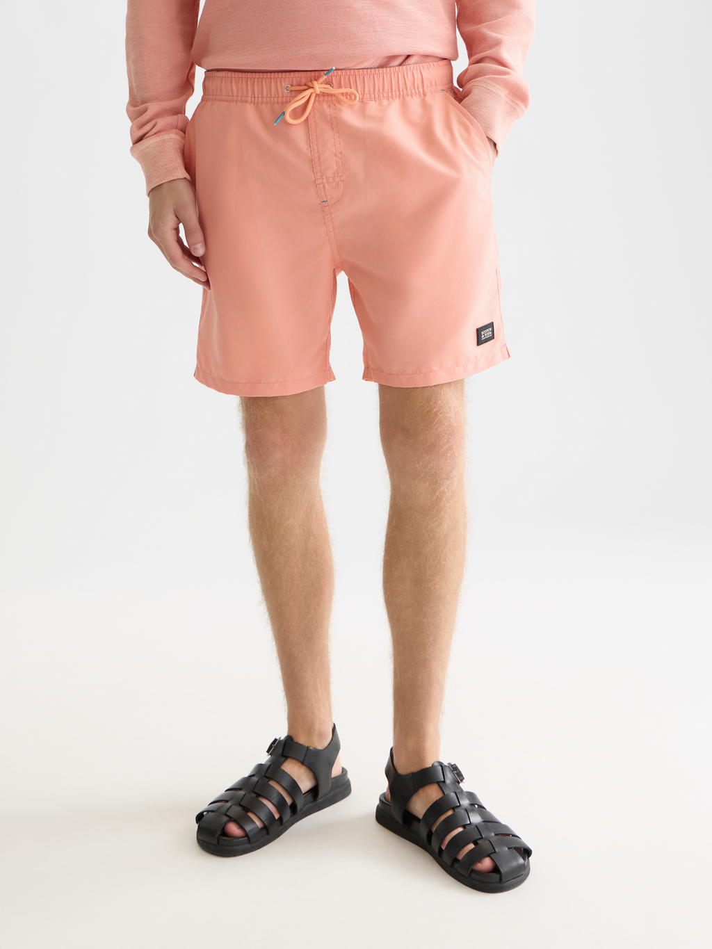 Solid midlength swim shorts