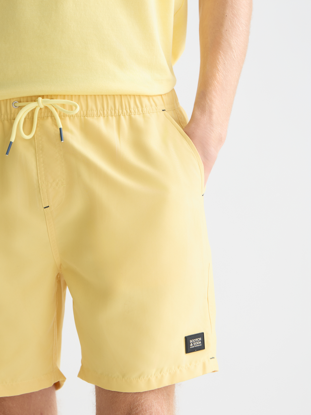 Solid midlength swim shorts