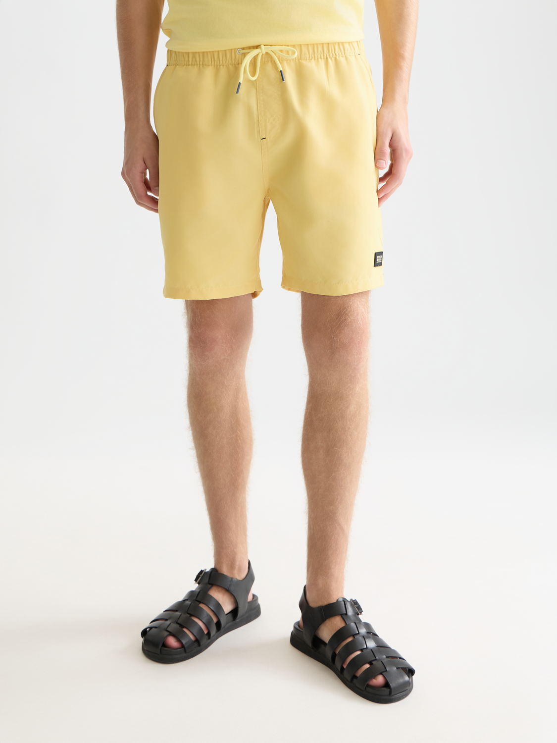 Solid midlength swim shorts