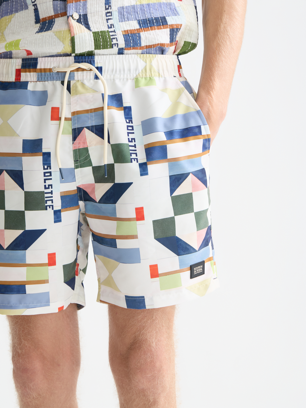 Printed mid-length swim shorts