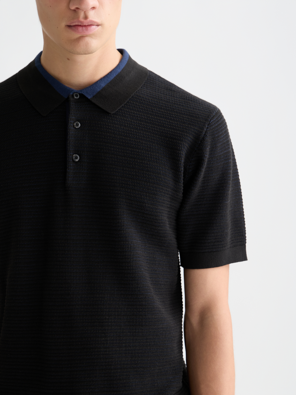 Structured knitted polo