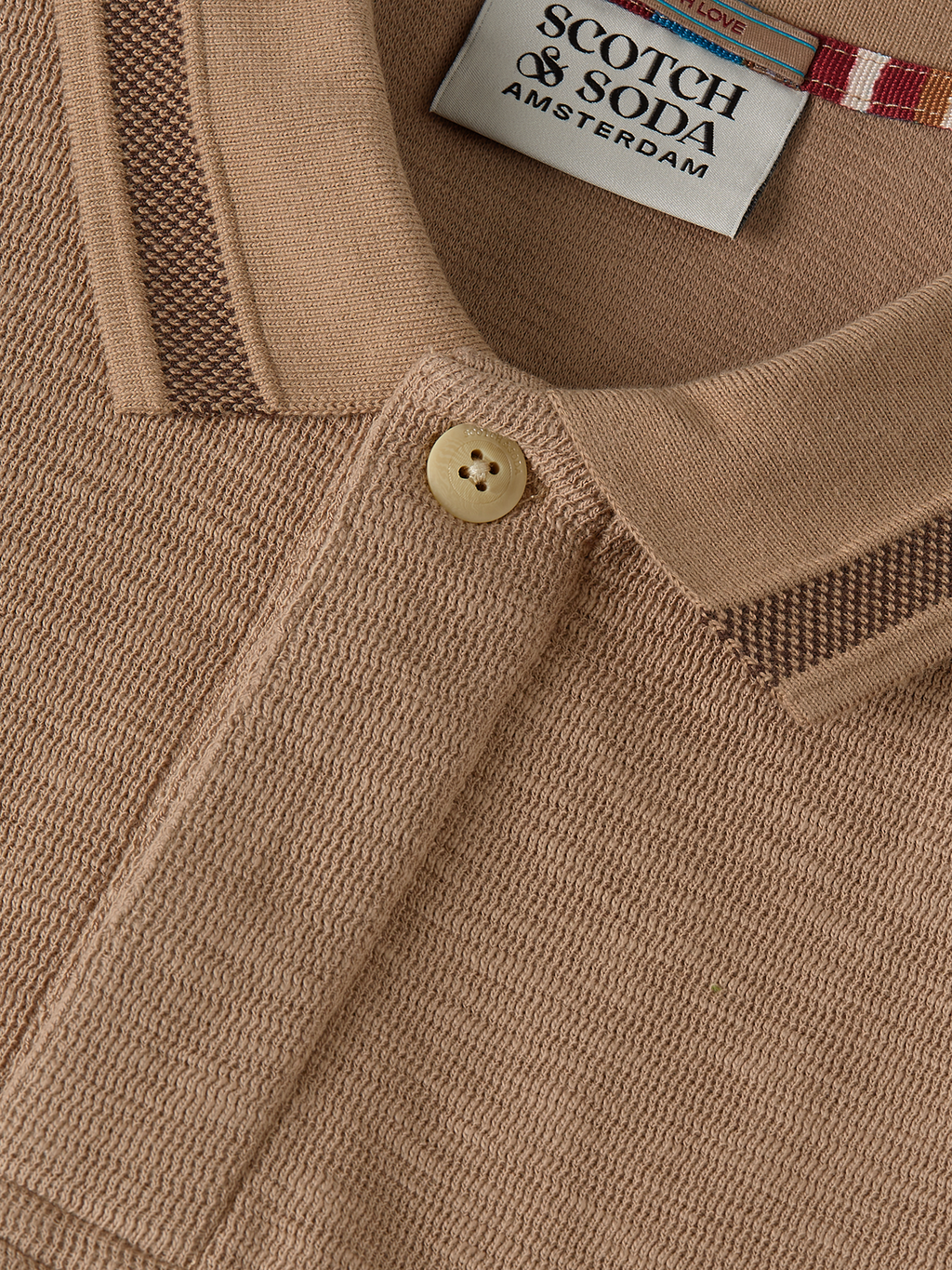 Structured relaxed long sleeve polo