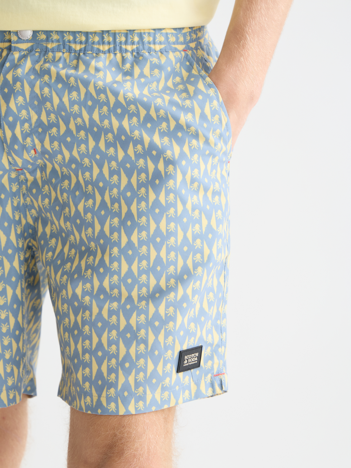 Printed mid-length swim shorts