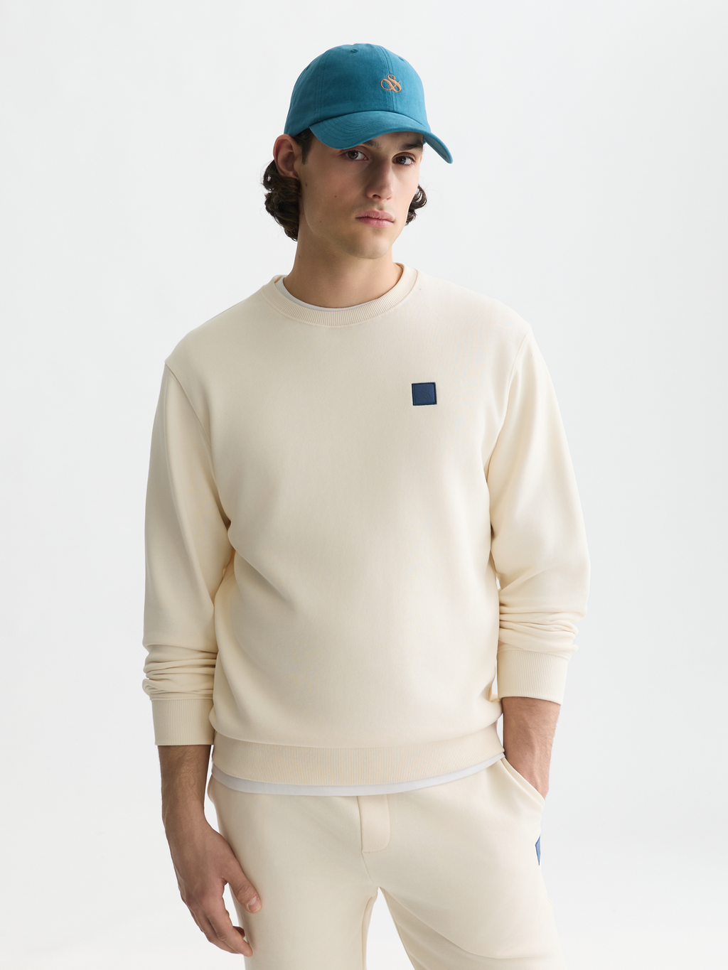 Seasonal Essentials logo badge sweatshirt