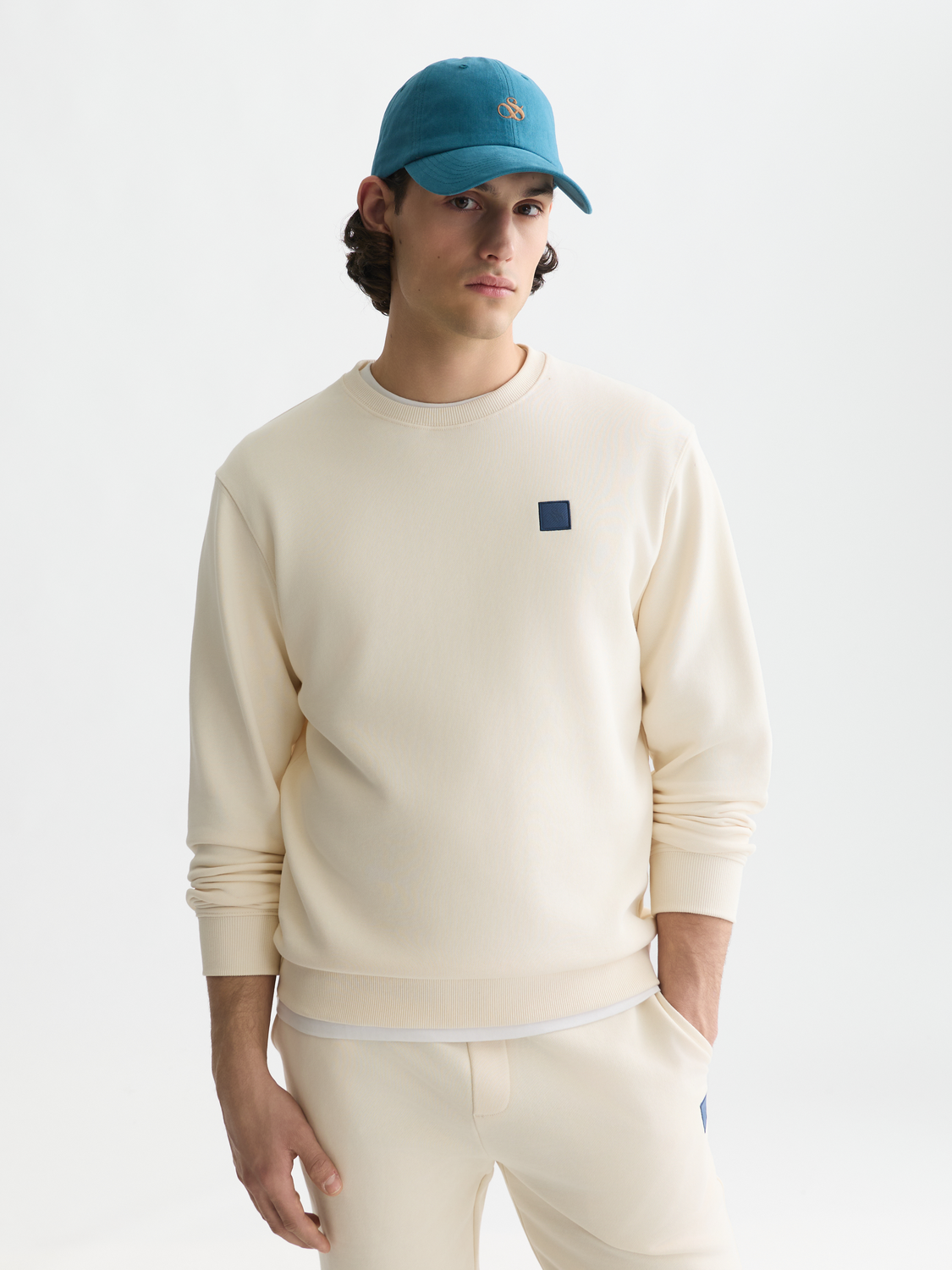 Seasonal Essentials logo badge sweatshirt