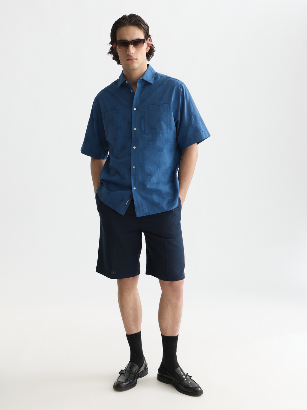 Pleated linen-blend herringbone wide chino shorts