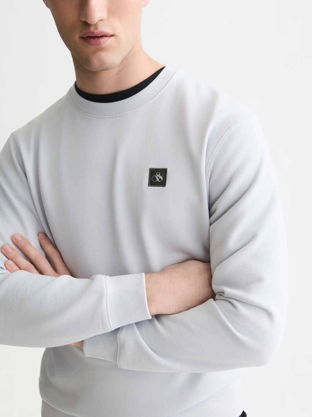 Seasonal Essentials logo badge sweatshirt