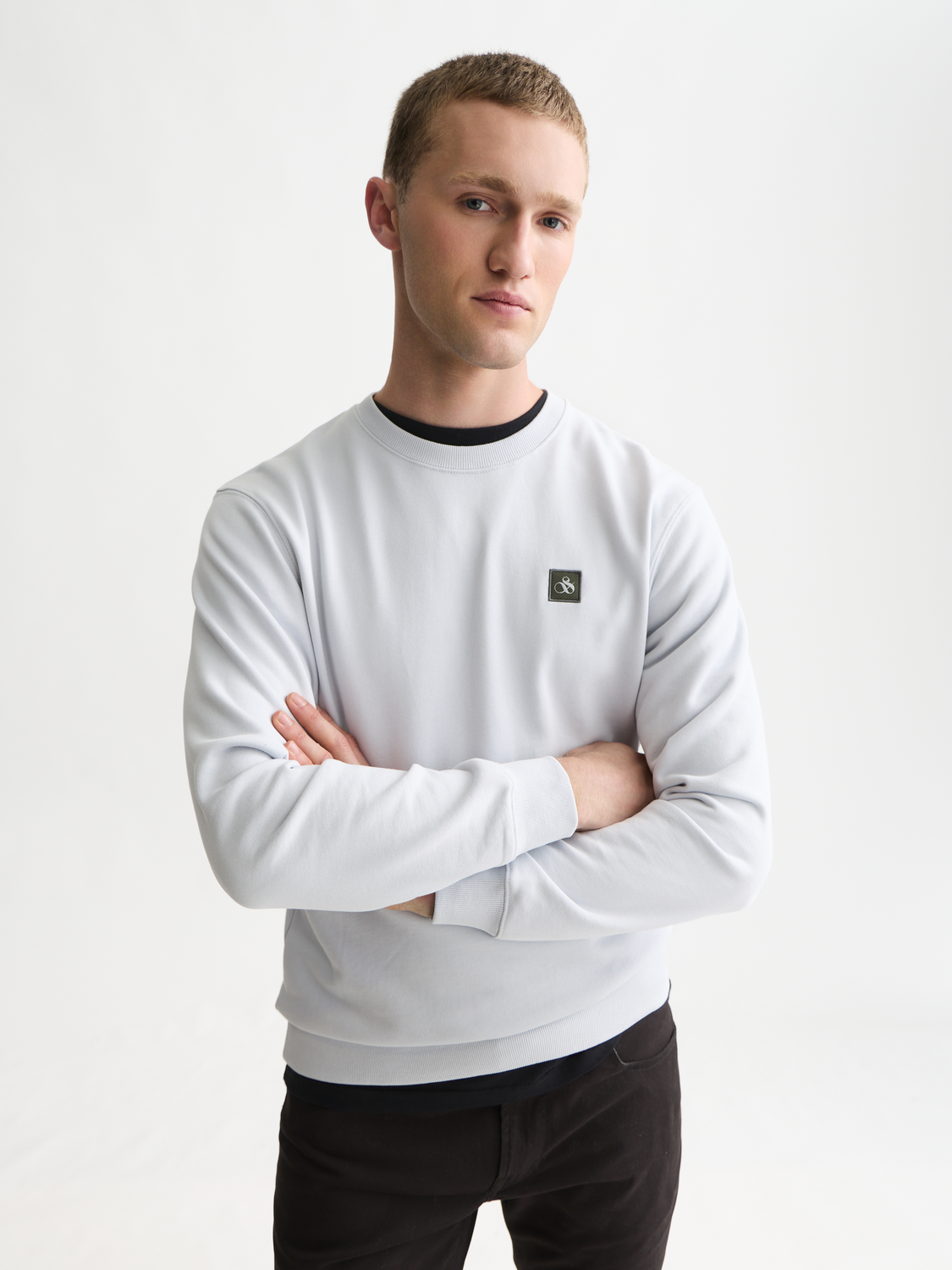 Seasonal Essentials logo badge sweatshirt