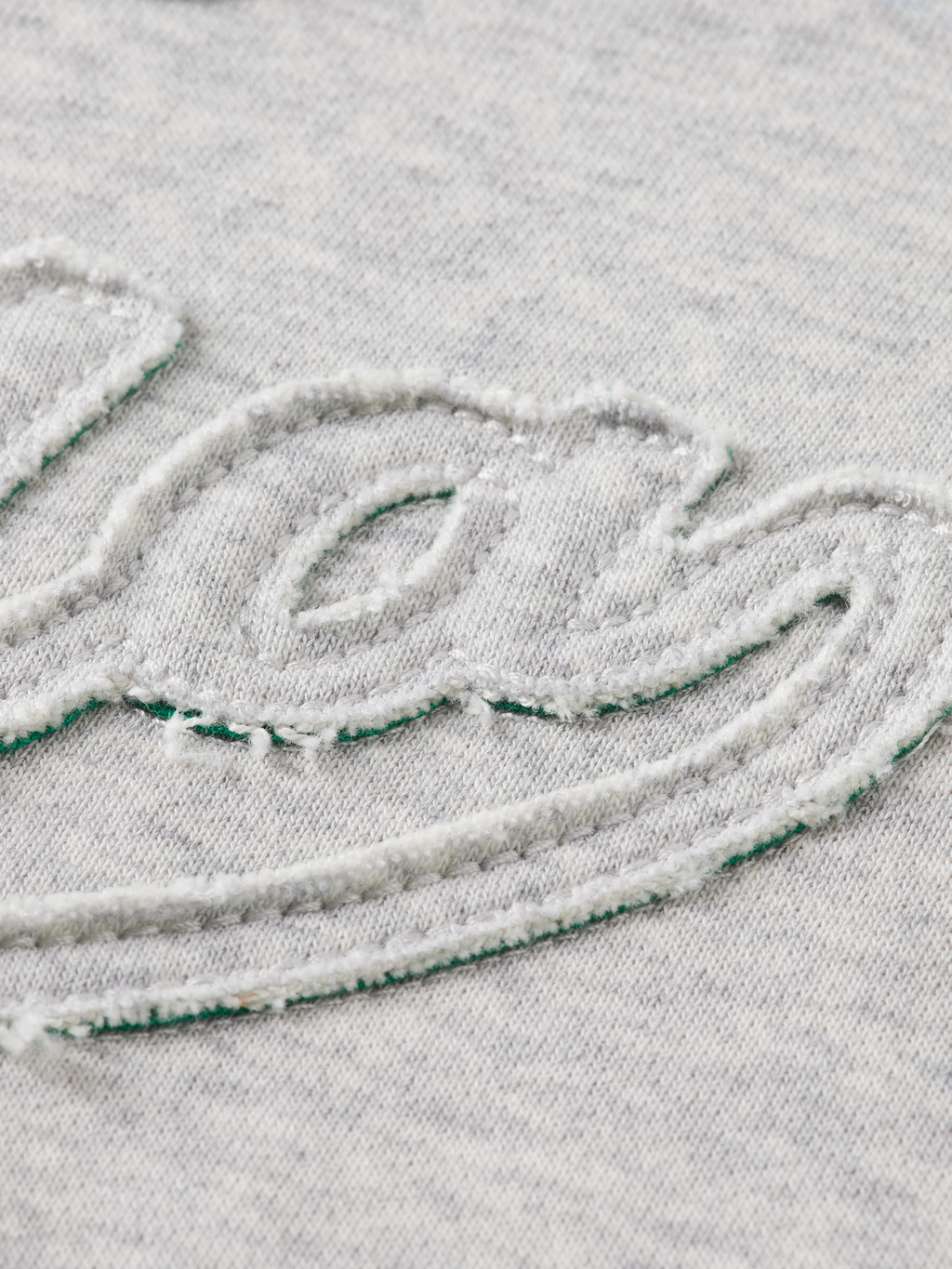 Applique artwork loose sweater