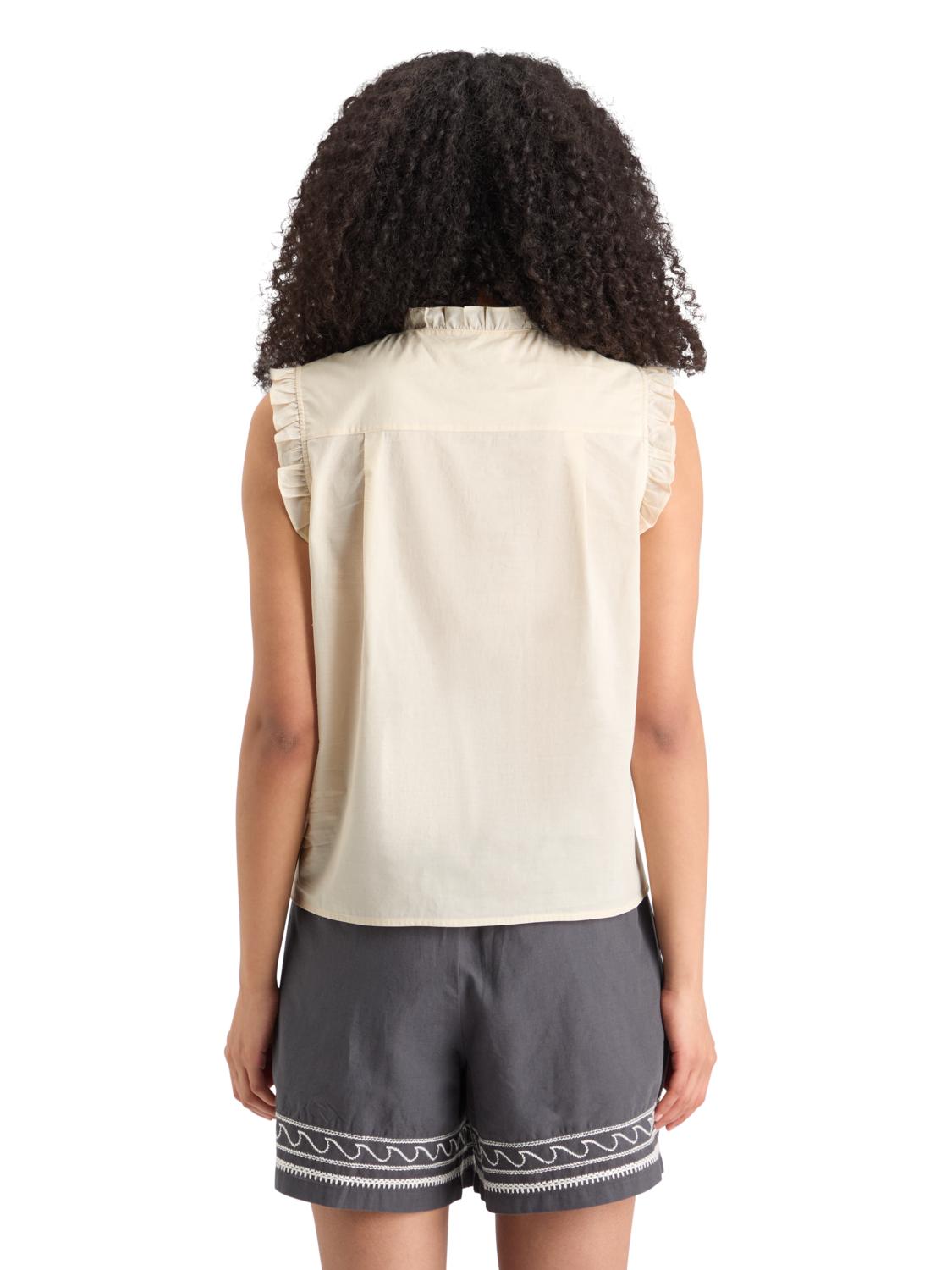 SLEEVELESS RUFFLE SHIRT