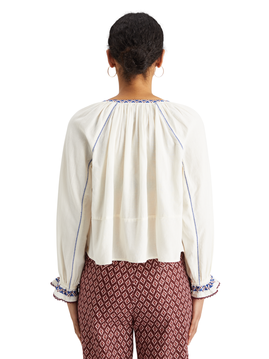 TOP WITH EMBROIDERY DETAILS