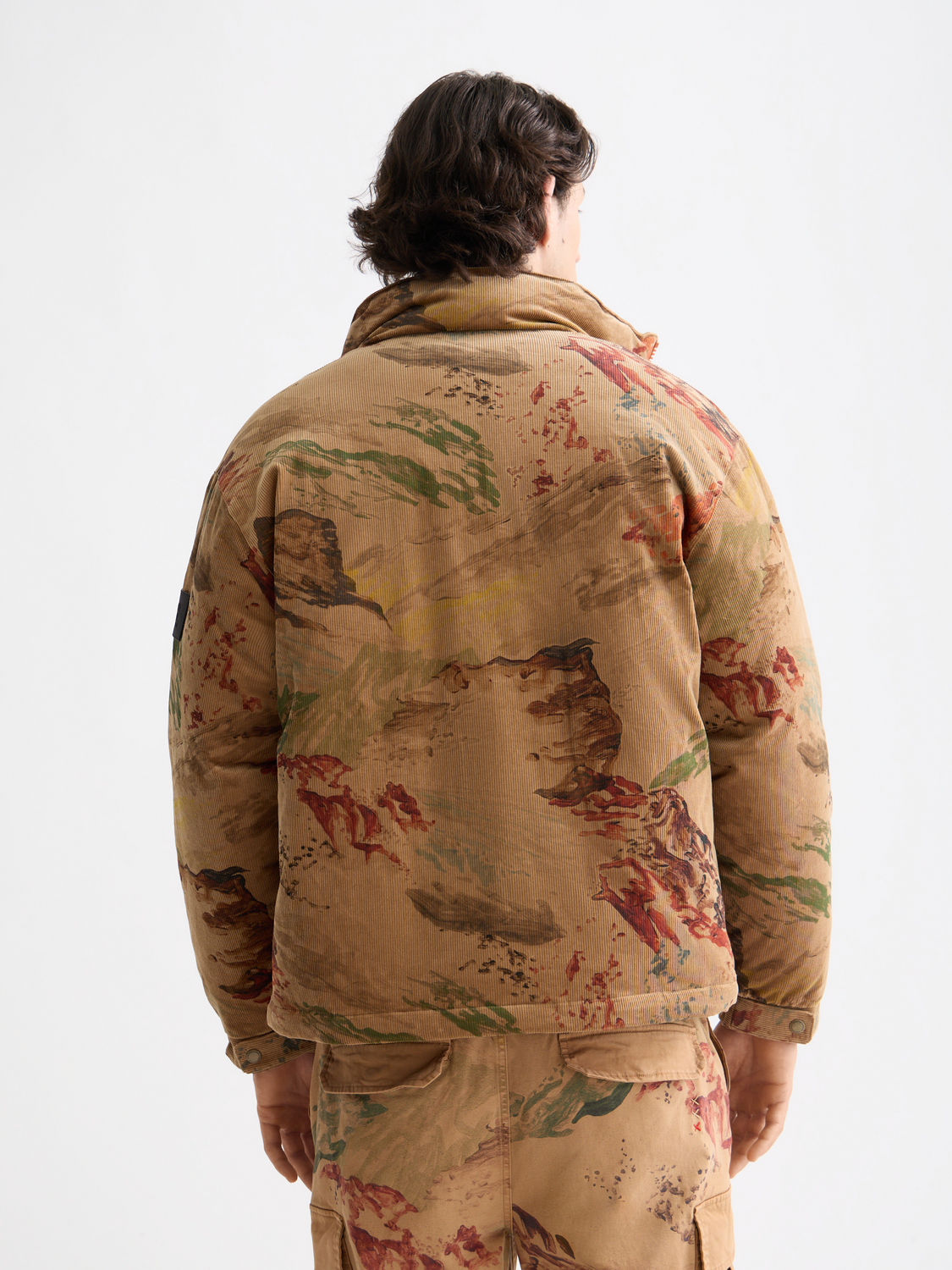 Mountain print corduroy puffer