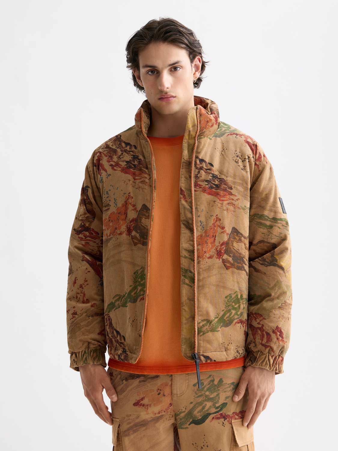 Mountain print corduroy puffer