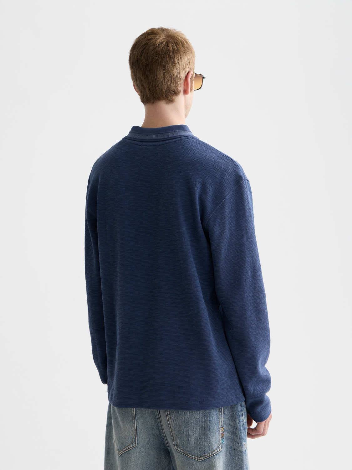 Structured relaxed long sleeve polo