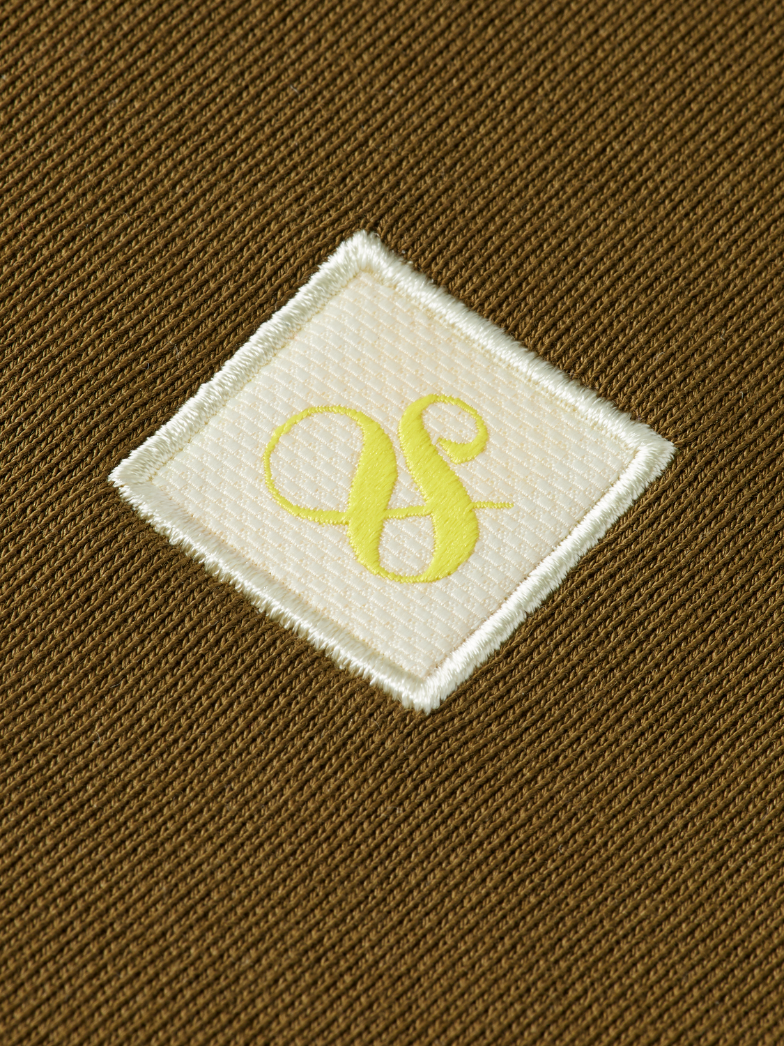 ESSENTIAL LOGO BADGE SWEATSHIRT