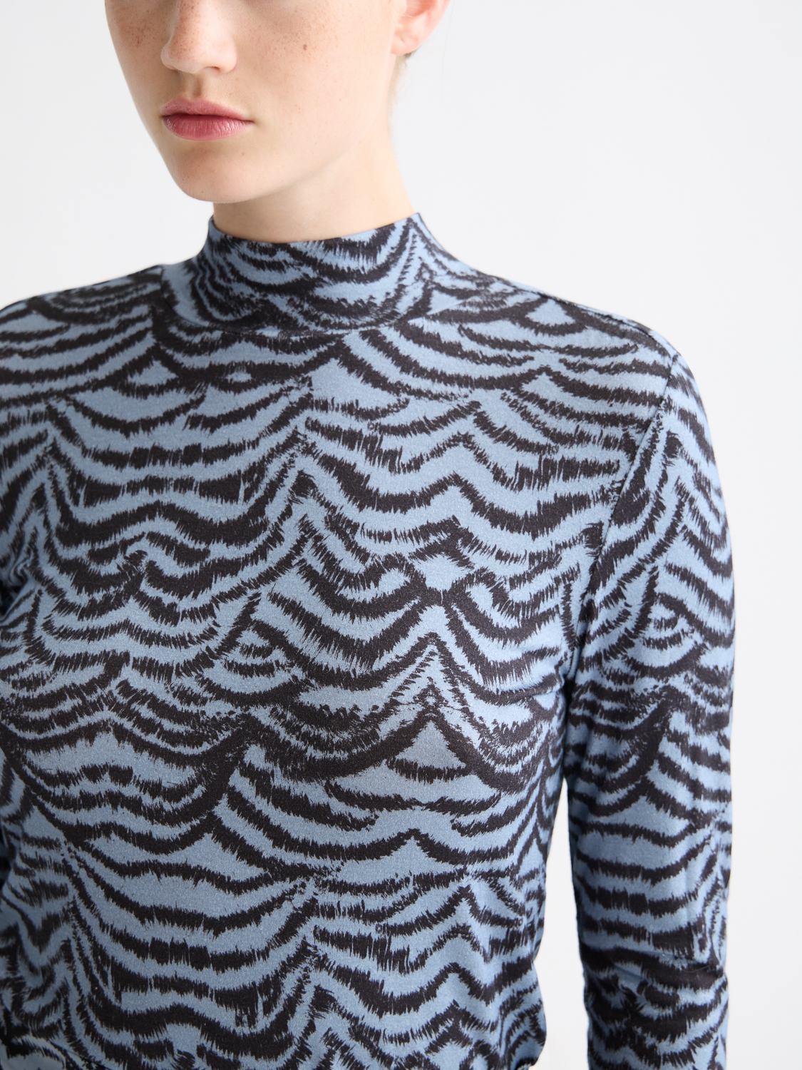 Printed mock neck long sleeve top