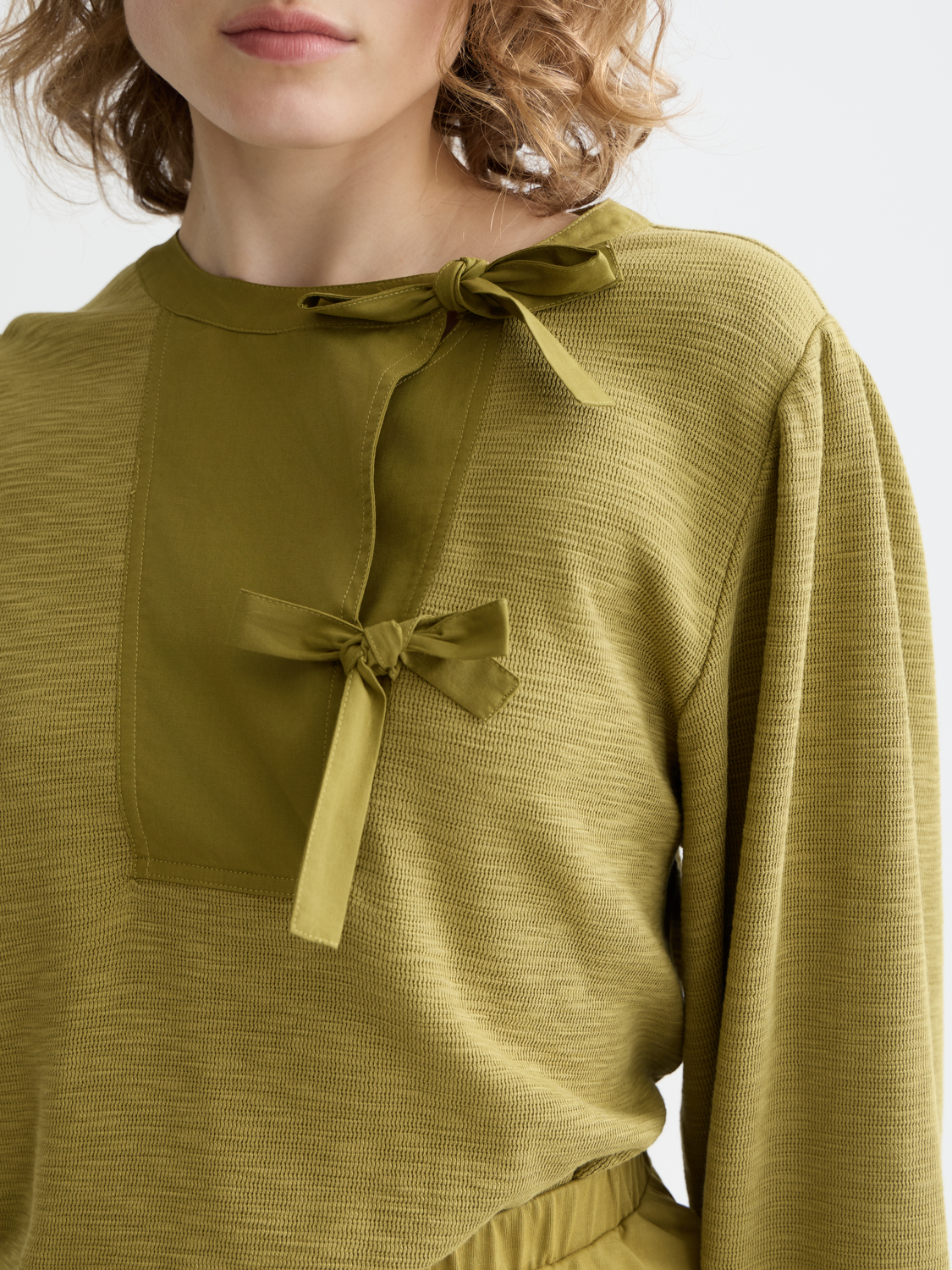 Open neck sweatshirt with woven front placket