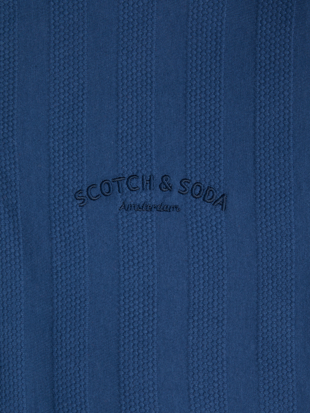 POPCORN PIQUE ZIP POLO