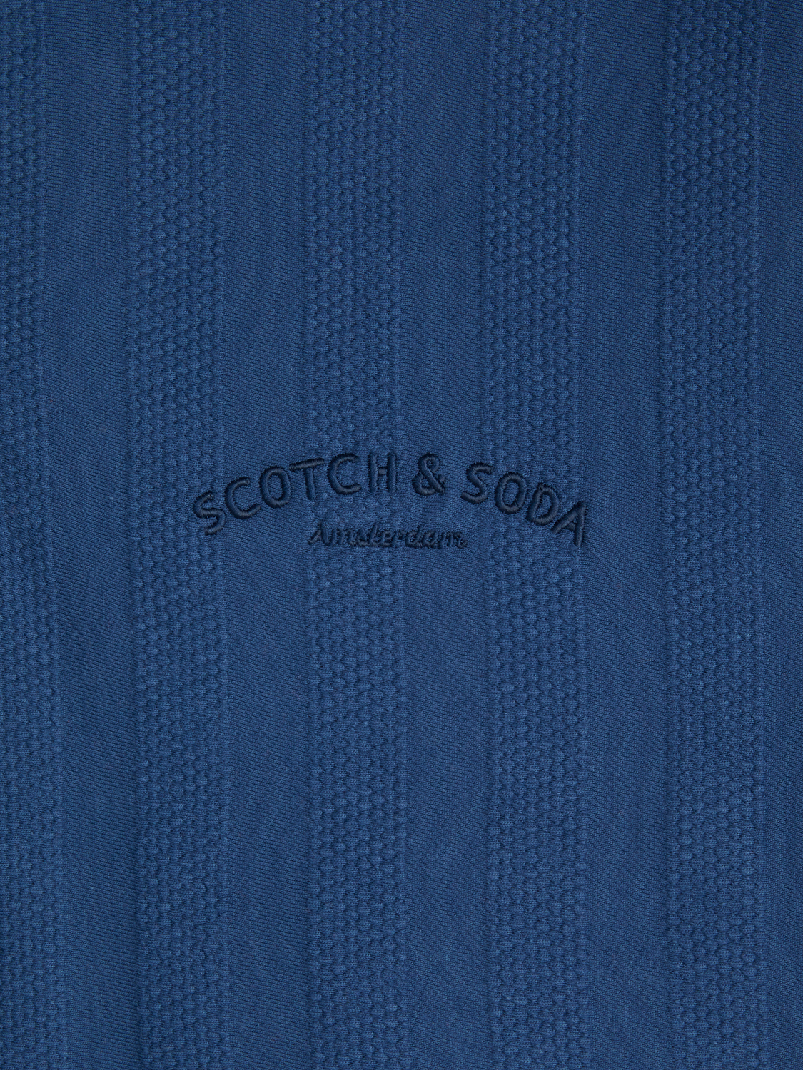 POPCORN PIQUE ZIP POLO