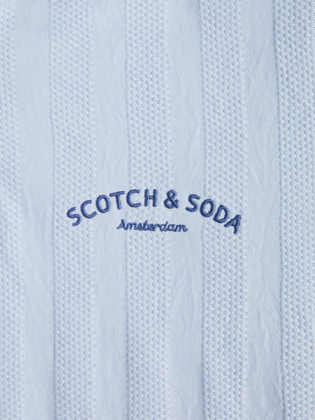 POPCORN PIQUE ZIP POLO