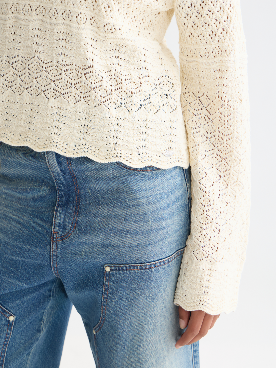 Pointelle stitch V neck pullover