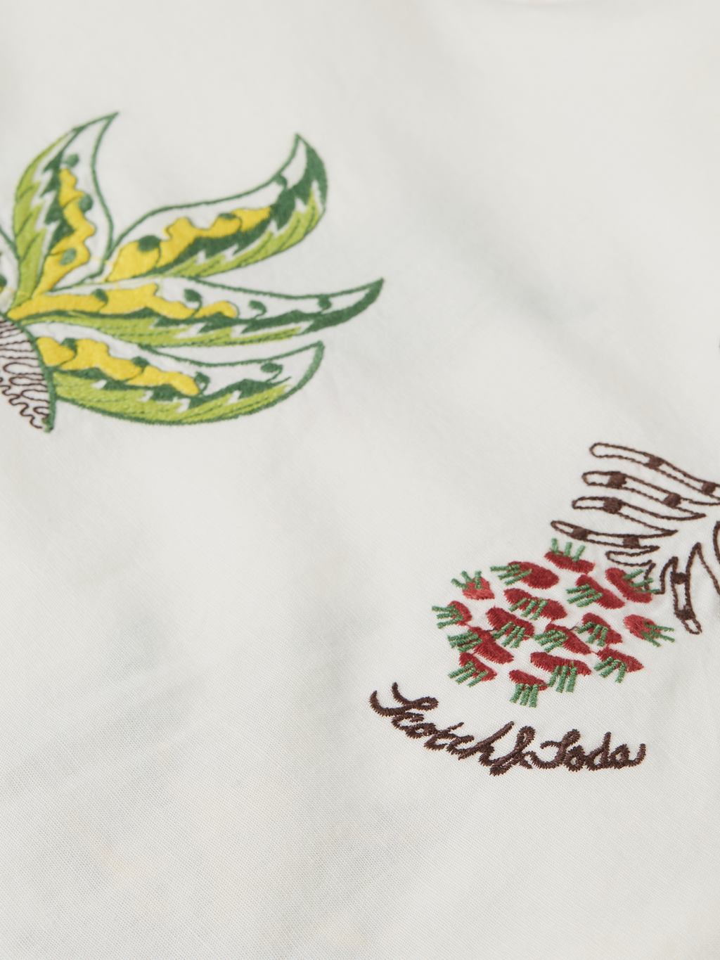 Embroidered short bib dress